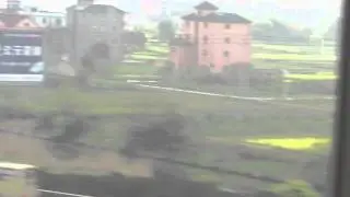 The view outside the bullet train's window [Hangzhou to Shanghai]. (MVI3189)