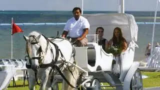 Moon Palace Wedding Bride entrance with horse and carriage and Flower Dude