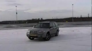 Subaru Forester Abusing on the nurburgring/ nordschleife gp pitboxen doing donuts in the snow