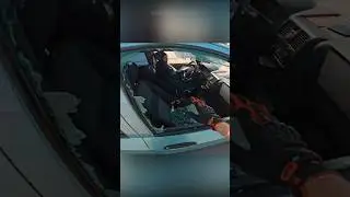 BIKER SMASHES WINDOW