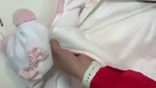 Утеплённый комбинезон розовый с ушками