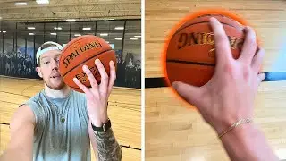 Can a 7'1 giant palm a basketball?