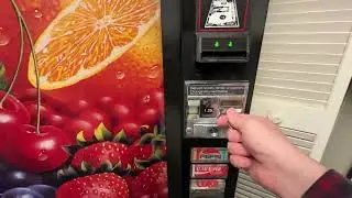 Getting another warm soda from a vintage vending machine!