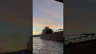 WOW!!! Master Salute between the James A. Baker and the Duluth Lift Bridge.