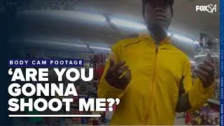 Body cam footage released shows man armed with knives at gas station