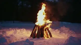 Listen to ambient music and the crackling bonfire after it snows