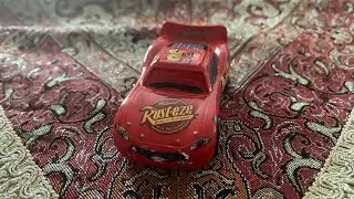 Disney Pixar Cars Diecast Sleeping Lightning McQueen (Rust Eze Racer Number 95)