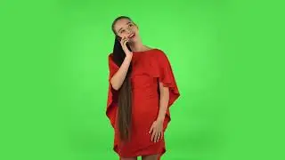 Pretty Young Woman Is Talking for Mobile Phone and Rejoicing  Green Screen  No Copyright