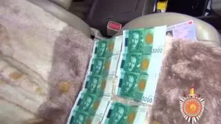 инспектора налоговой службы, подозреваемого в вымогательстве крупной суммы взятки