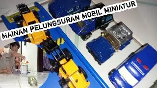 mainan pelungsuran mobil miniatur