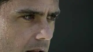 extreme close up portrait of a man serving a tenni LVDE7CH