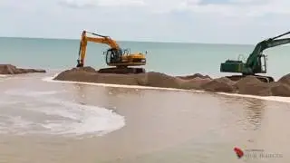 Расчистка промоины между лиманом и Азовским морем