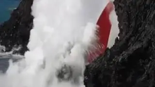 The lava flows of the Kilauea Volcano move into the ocean