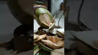 peeling coconut