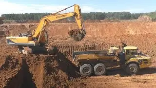 Hyundai Robex 300LC-9S loading Cat and Volvo ADT`s part 2