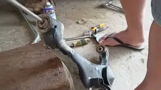 REPLACE SWING ARM BUSHING / NISSAN NAVARA.