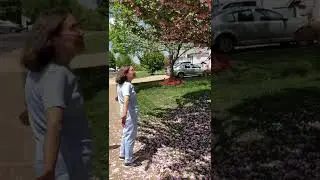 My sweetheart is enjoying flower pedals raining down. Reminds us of our wedding day.