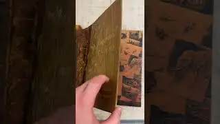 A unique wooden binding on a book from the early 20th century! We have never seen anything like i...