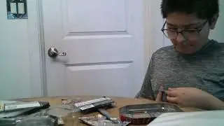 Opening the Pokemon Tin pack