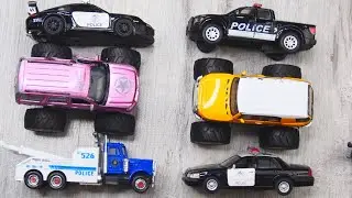 Monster trucks and police cars reviewed in hands