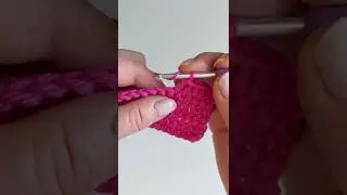 My way of holding the crochet hook and yarn