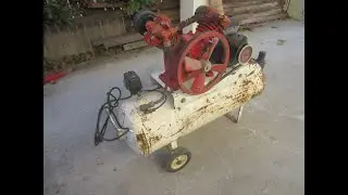 restoration of old air compressor using spray cans of paint and wood