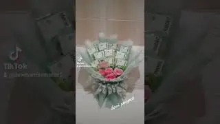 buket uang dengan bunga mawar pink