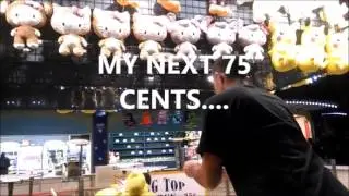 winning the QUARTER TOSS game at MAGIC MOUNTAIN