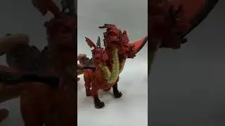 Музыкальный трехголовый динозавр