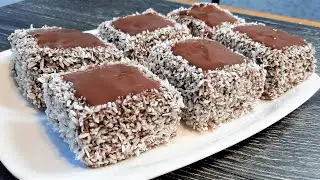 Biscuit chocolate dessert in coconut flakes