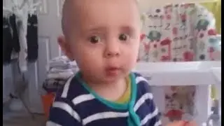 Cute baby saying no to raspberries in a funny way - I don't like it daddy :D