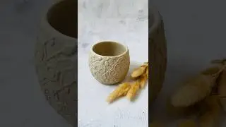 Cute little cup with embossed doily texture. #handmadeceramics #ceramicsart #pottery #texturedvase