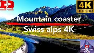 Mountain coaster in Swiss alps in 4k