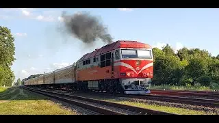 Diesel locomotive TEP70-0235 with a passenger train