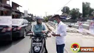 JELANG NATAL DAN TAHUN BARU,LSM PMPRI NIAS BAGIKAN 1000 MASKER UNTUK MASYARAKAT NIAS