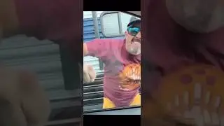 Guy punching car window to I gotta feeling