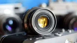 Industar-61 lens with yellow coating. Commonly known as 