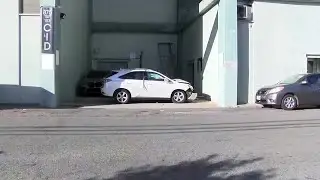 Woman, 64, in serious condition after vehicle plunges out of parking structure