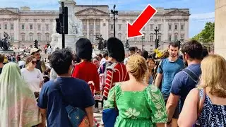 GUARDS TAKE AN ULTRA-RARE ROUTE THROUGH THE BUSY CROWDS OUTSIDE BUCKINGHAM PALACE