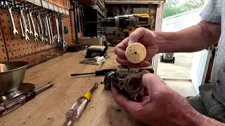 A day of repairs. I repair a generator, chain saw, Weed eaters, push mower and a blower