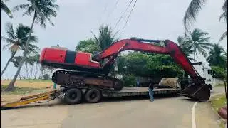 How to load an Hitachi Excavator into a truck for beginners