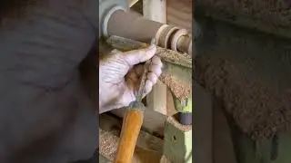 Turning a baby rattle with my dad.
