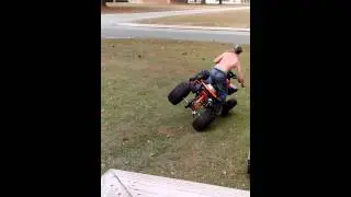 11 year old Riding four wheeler on two wheels