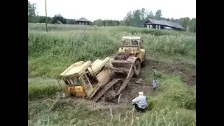 кировец вытаскивает из грязи Т-130
