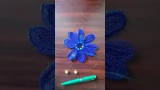 Бисерден күнбағыс ретінде гүл жасау.