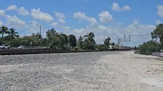 Brightline northbound across the Jupiter Drawbridge over the Loxahatchee River