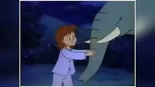 Girl tickled by elephant
