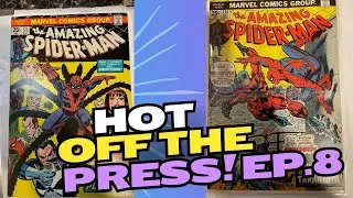 Cleaning and pressing 2 Spider-man comic books