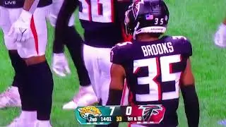 Falcons DB #35 Natrone Brooks w/great open field tackle.
