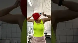 Why do some swimmers struggle so much to put on their swim cap?